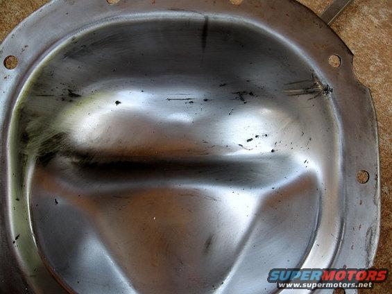 Differential cover with dents and scratches