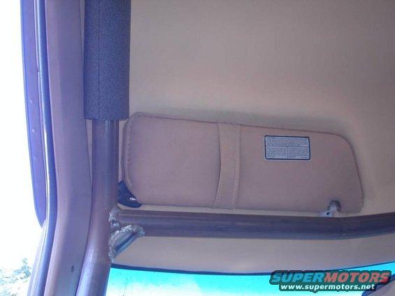 Sunvisor trimmed to clear the roll cage