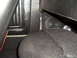 1973 Ford Ranchero - The photo shows the interior of a vehicle, focusing on the carpet and a speaker.