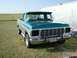 1979 Ford F-150 - This pickup truck has a two-tone paint scheme with a green cab and silver trim. The license plate reads "WANTED".