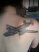 1996 Ford Bronco - Tattoo of a bomber airplane on a person's shoulder.
