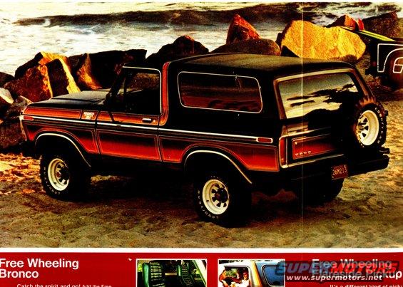 Black Ford Bronco with red and orange stripe, spare tire on rear, parked on beach