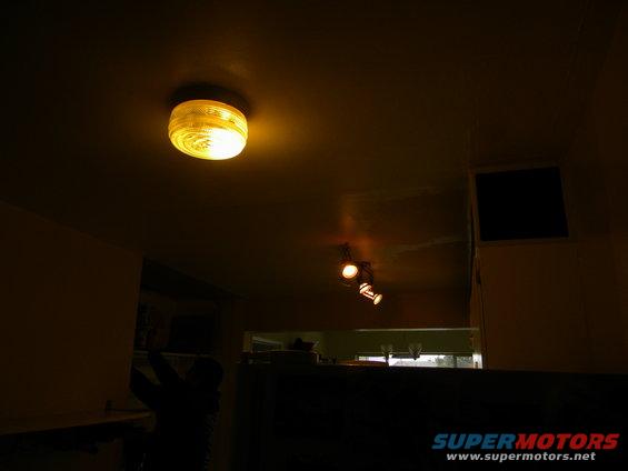 Interior ceiling light fixture with yellow glow