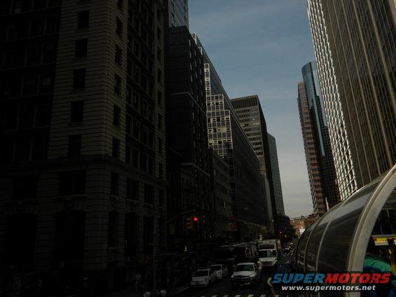 White SUV on city street