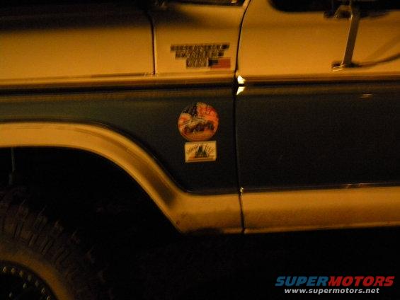 Side view of a Ford Bronco with stickers on the door