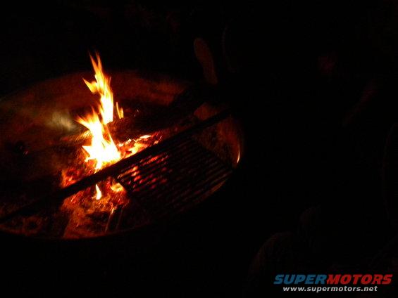 Campfire burning at night