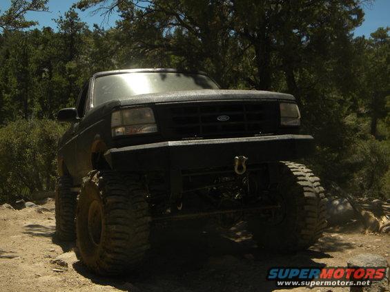 1992 Ford Bronco front view with large tires and custom bumper