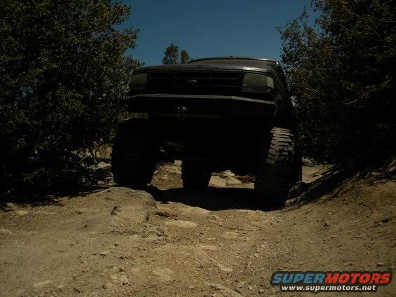 1992 Ford Bronco on a rocky trail, front view