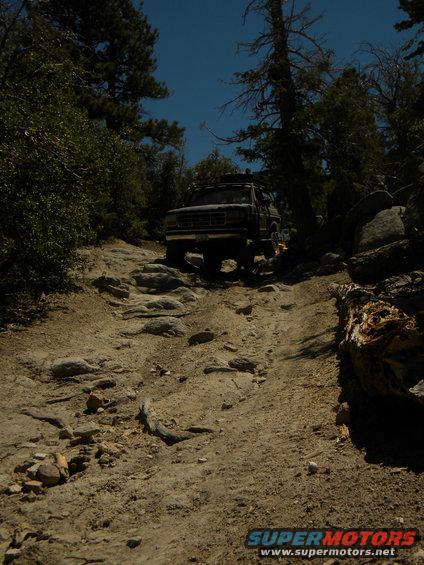 1992 Ford Bronco on a rocky mountain trail