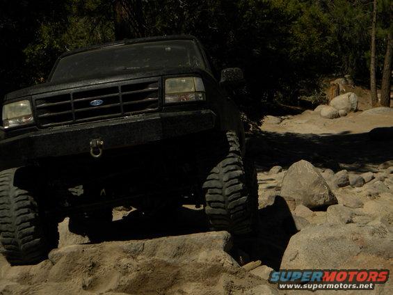1992 Ford Bronco navigating rocky terrain