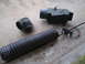 2005 Ford Excursion - Military heater unit, flexible ducting, and headlight assembly are laid out on concrete.