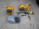 1988 Ford Bronco - Transfer case parts and linkage for a vehicle, laid out on a concrete surface.