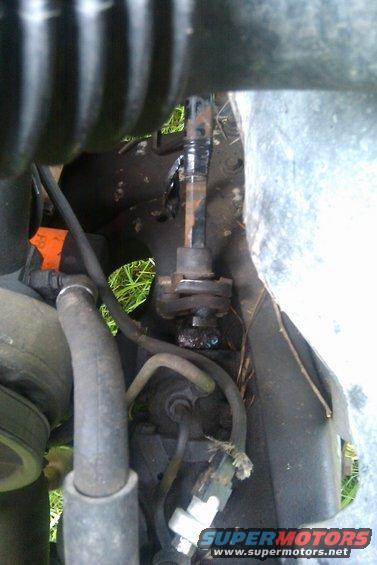 Steering column joint with visible grease and rust