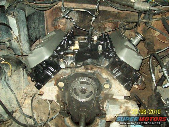 Engine block showing timing chain and gears, with valve covers installed