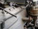 1995 Ford F-150 - Engine parts are visible in this close-up view, showing various metal components and wiring.
