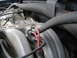 1995 Ford F-150 - Close-up view of engine components, including an intake manifold and spark plug wires.