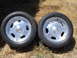 1972 Ford Pinto - Two aftermarket wheels and tires are shown outdoors. The Supermotors.net logo is visible.