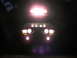 1988 Ford Bronco - This vehicle is equipped with numerous auxiliary lights, illuminating the dark surroundings.