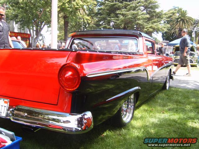 1956 Ford Fairlane pickup truck, red and black two-tone paint, chrome bumper, custom wheels