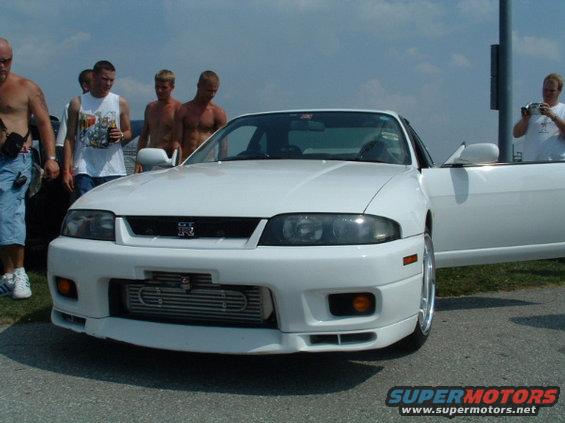 White coupe with large front-mounted intercooler and 'GT-R' badge
