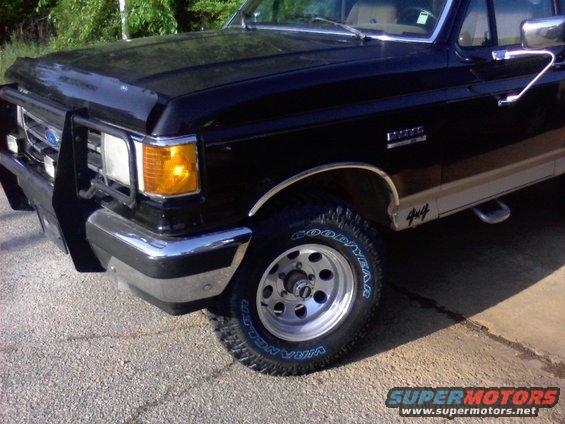 Black 1990 Ford Bronco 4x4 with chrome bumper and bull bar