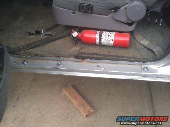 Three of 4 bolts holding new slider in rocker box