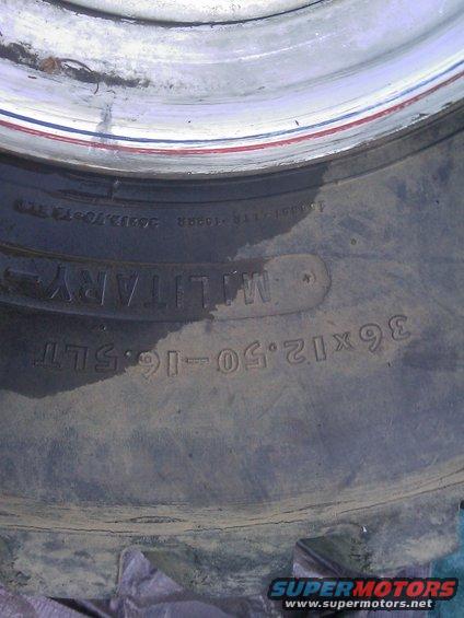 Tire sidewall shows "36x12.50-16 5LT MILITARY-" and other markings