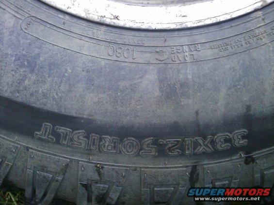 Tire with text 33x12.50R15LT and load range 1030