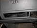 1988 Ford Bronco - Close-up of a vehicle's interior dashboard, showing the glove compartment, a speaker, and air conditioning vents. The word 'Jeep' is emboss…