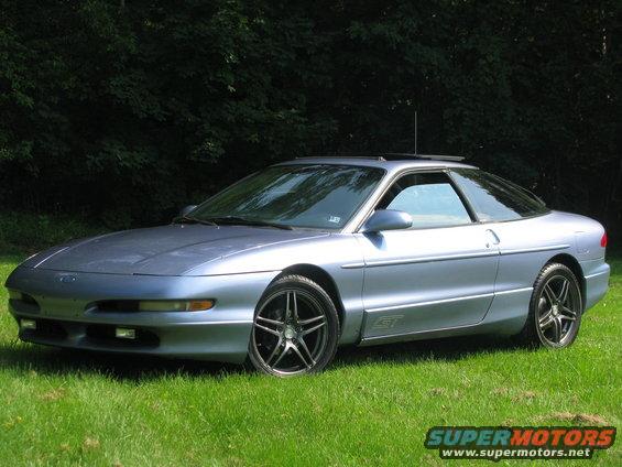 Blue 1994 Ford Probe GT parked on grass