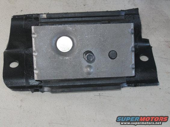Motor mount with metal plate and rubber base