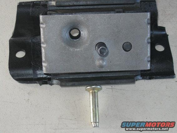 Engine mount part with metal plate and rubber isolator