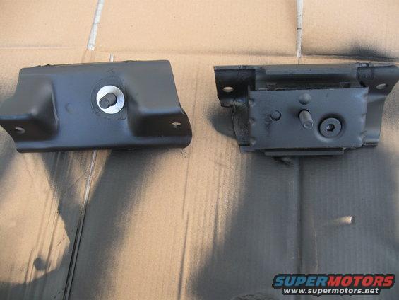 Two black metal motor mounts with rubber dampening, one on the left and one on the right