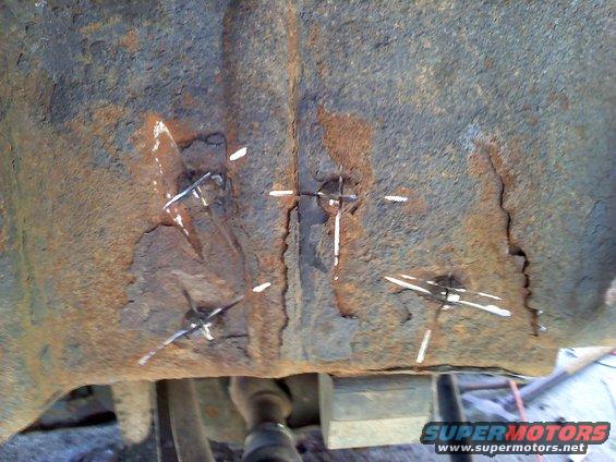 0622001532.jpg ground x's on the rivets for spring buckets then chisled em off