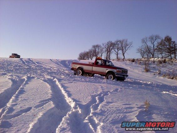 0109001524.jpg doin a little snow wheeling. I was pulin everyone out.