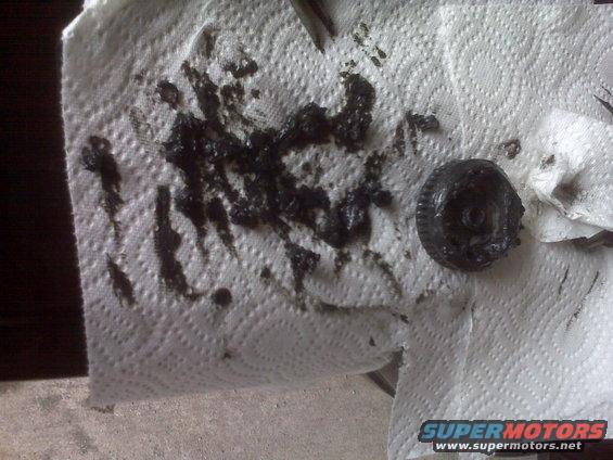 img00049.jpg All that grease has chunks of plastic in it. Stupid bushings!