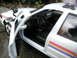 2001 Audi A4 - A close-up view of a white police car model's interior, showing the dashboard and seats.