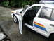 2001 Audi A4 - Model police car with 'POLICE' text and colorful side stripes.