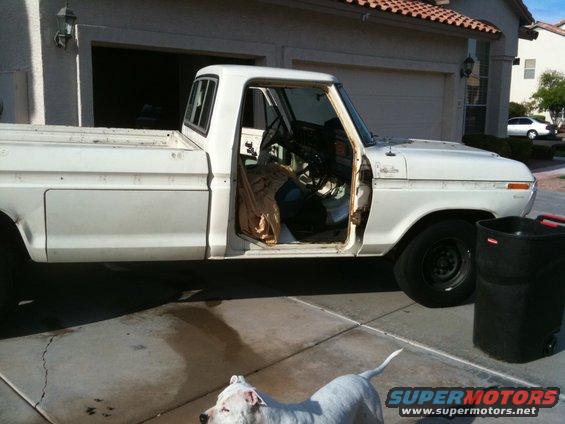 1979 Ford F-350 pickup truck with driver's door open, parked in driveway