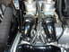 1978 Honda GL1000 - Close-up view of a motorcycle's engine, focusing on the dual carburetors and spark plug wires.
