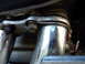 1978 Honda GL1000 - Detail shot of a motorcycle's exhaust system, showing the junction of pipes and mounting hardware.