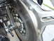1978 Honda GL1000 - Close-up view of a motorcycle's rear brake system, showing the rotor and part of the swingarm.