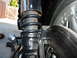 1978 Honda GL1000 - Detail shot of a motorcycle's rear suspension and braking components.