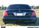 1995 Ford Crown Victoria - Rear view of a black Ford Crown Victoria with a Colorado license plate and a Panther emblem.