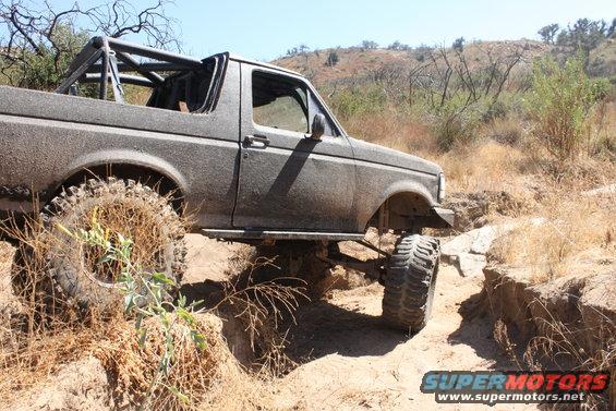 Gray off-road vehicle on a trail, 1992 Ford Bronco