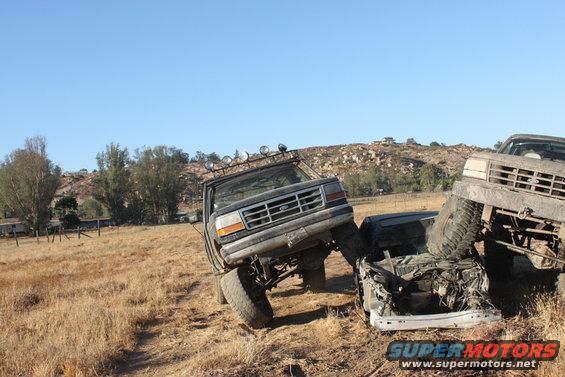1992 Ford Bronco on top of another vehicle, front view