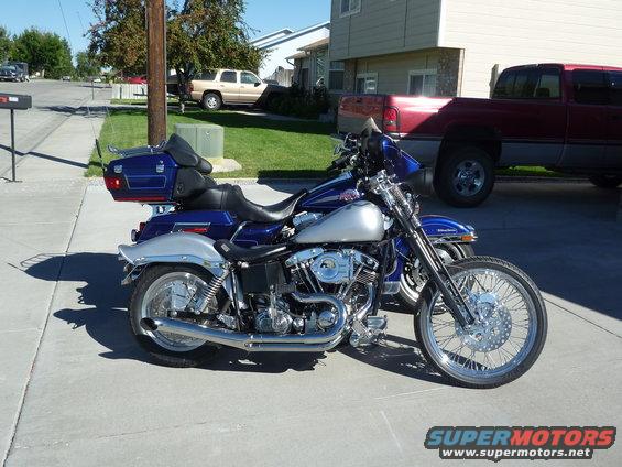 2007 Harley-Davidson Electra Glide Clsc parked next to another Harley-Davidson
