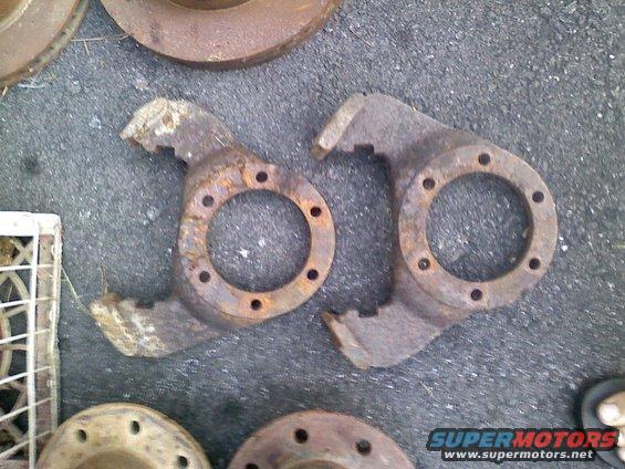Pair of rusty steering knuckles, possibly from a 4x4