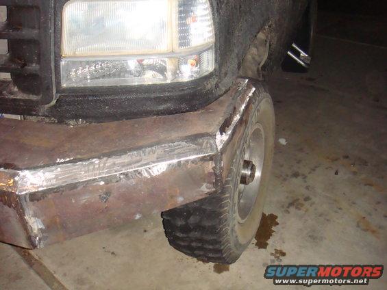 1992 Ford Bronco front corner with custom welded steel bumper and tire