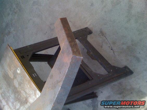 Metal frame part on concrete floor